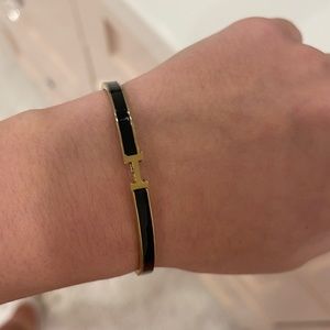 Hermès black and gold bracelet